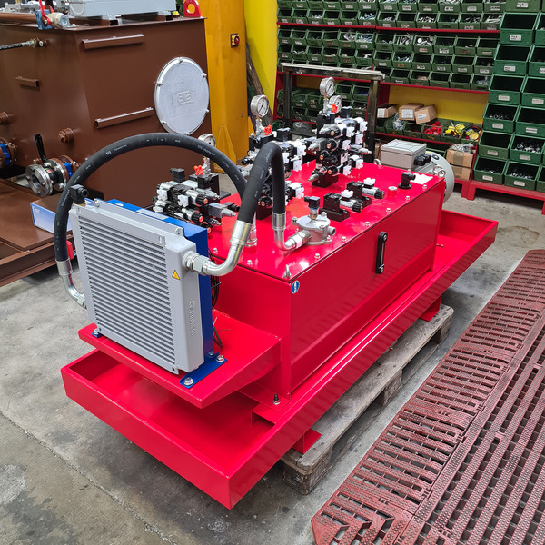 Hydraulic power pack for tilting beam control